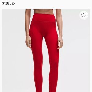 Lululemon Swift Speed High - Rise Tights in a red color. Designed with pockets